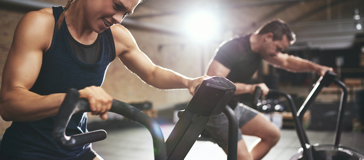 people on bikes in gym